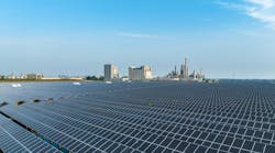 Chemical plant partially powered by adjacent solar field.