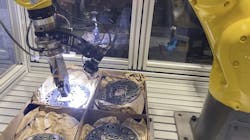 MirAI 2 used with a Fanuc robot to pick highly reflective brake pads from random positions and with changing backgrounds.