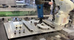 This robot work cell developed by AMT Precision Parts features Kawasaki robots using off-the-shelf tools for applications such as polishing, routing, drilling, grinding and deburring.