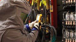 Keithly Project Manager Zach Bryson uses a Fluke CNX compatible infrared camera to inspect fuses and power capacitors while the