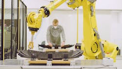Operator load station application using FreeMove and Fanuc robot.